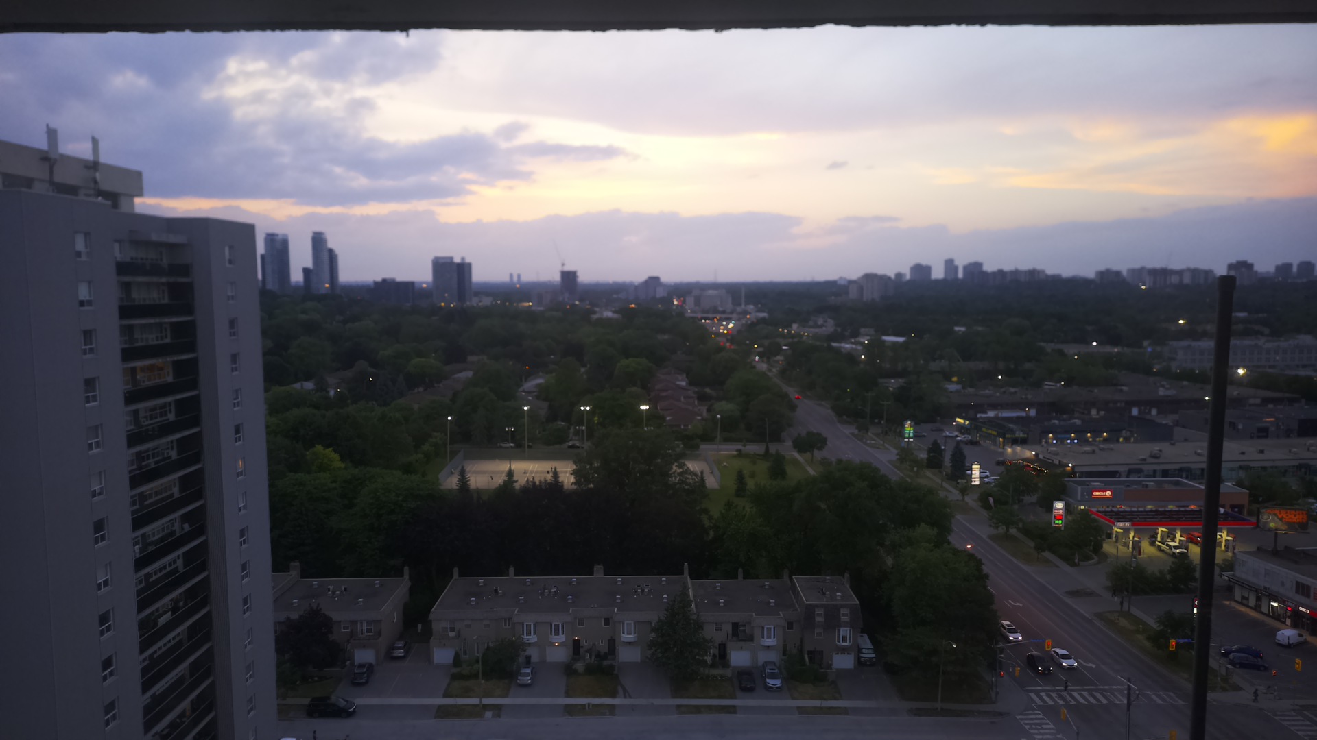 The same view at 9 p.m., under a pink and orange sunset
